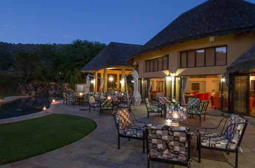 Relax on the patio chairs at Ivory Tree Game Lodge,Pilanesberg National Park, South Africa Pilanesberg Ivory Tree Game Lodge Big 5 Malaria Free Pilanesberg National Park South Africa